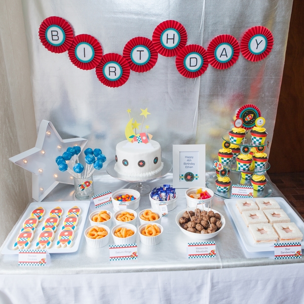 Kids space rocket party buffet table