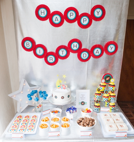 Kids space rocket party food and banner