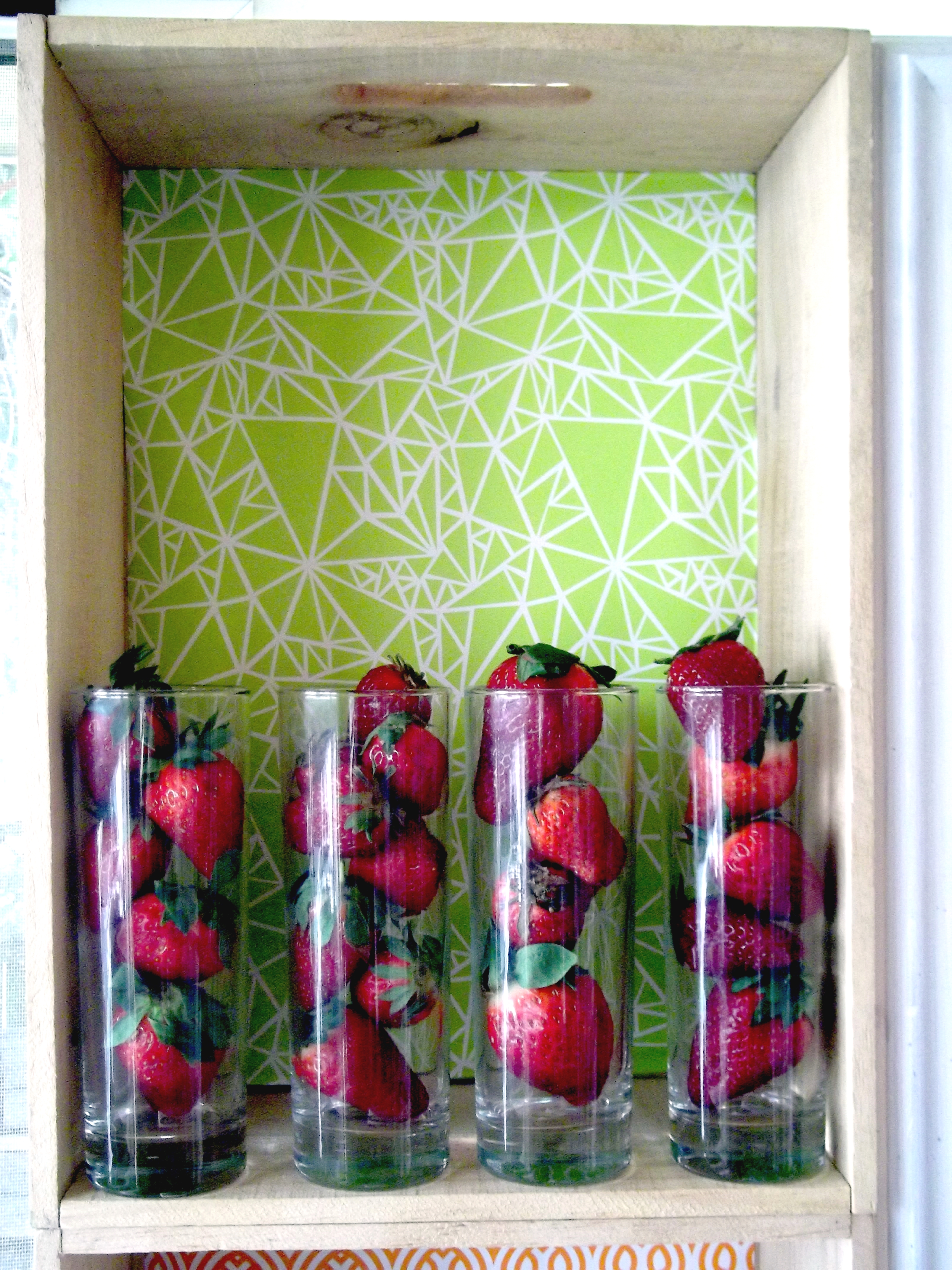 Strawberries and tall glasses